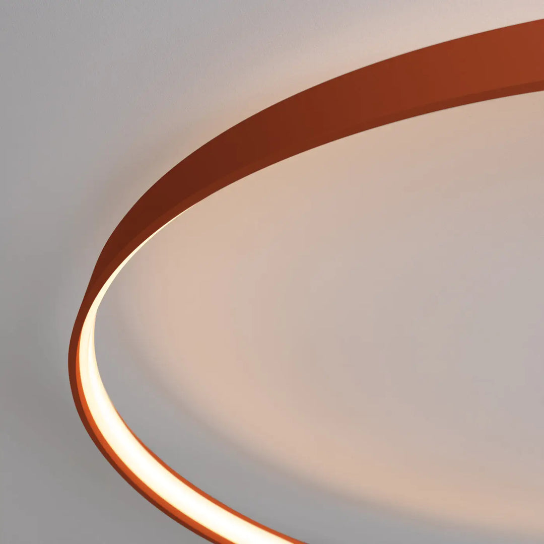 Luminaire plafonnier rio 110 rouge ocre avec anneaux led en aluminium alliant élégance et lumière ambiante douce