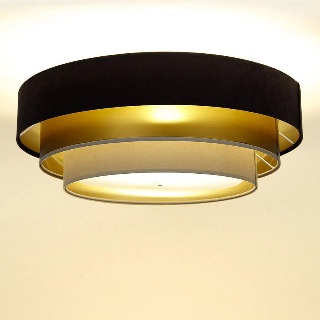 Luminaire plafonnier marron avec design en couches en velours noir, accents métalliques dorés et abat-jour beige