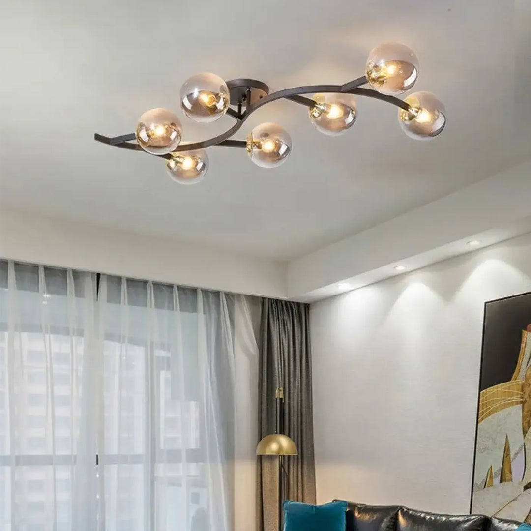 Luminaire plafonnier métal doré avec boules en verre moderne