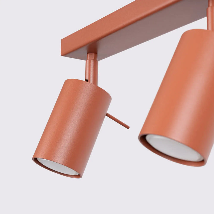 Luminaire plafonnier ring 2 couleur rouge ochra avec lampes ring cylindriques cuivrées au design minimalisme moderne et éclairage flexible