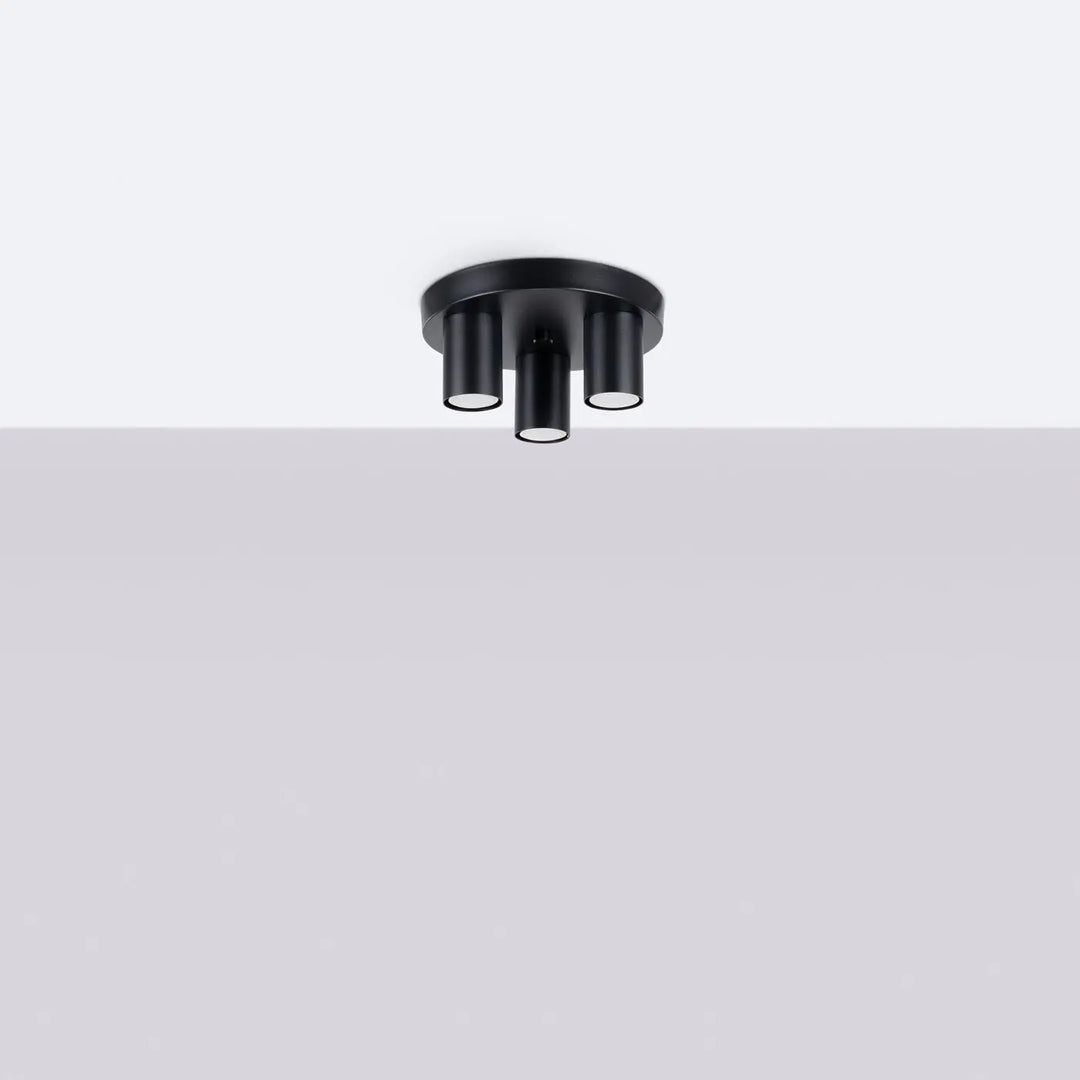 Plafonnier lagos noir avec trois spots cylindriques pour un caractère chic et une lampe lagos moderne