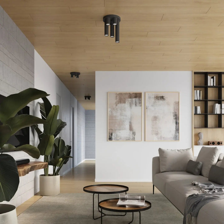 Plafonnier lagos noir cylindrique avec trois ampoules verticales pour un caractère chic et design lampe lagos