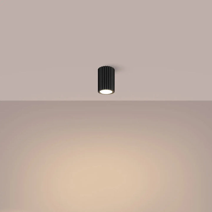 Plafonnier karbon allie design minimaliste noir cylindrique avec ampoules gu10 interchangeables et centre lumineux chaud