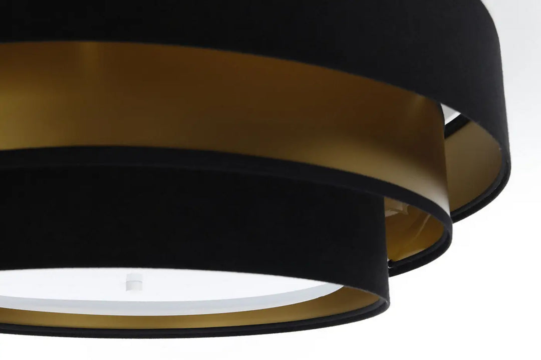 Luminaire plafonnier noir et doré à abat-jour en forme de tambour à plusieurs niveaux plafonnier noir élégant triniti