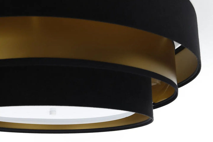 Luminaire plafonnier noir et doré à abat-jour en forme de tambour à plusieurs niveaux plafonnier noir élégant triniti