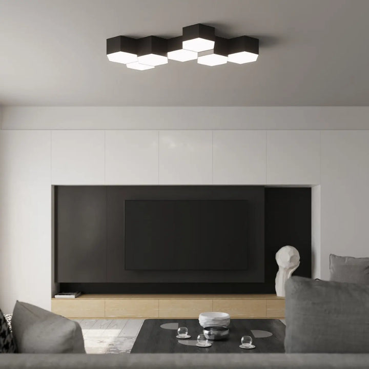 Luminaire plafonnier sunde 11 noir avec formes géométriques hexagonales noires et panneaux lumineux modernes
