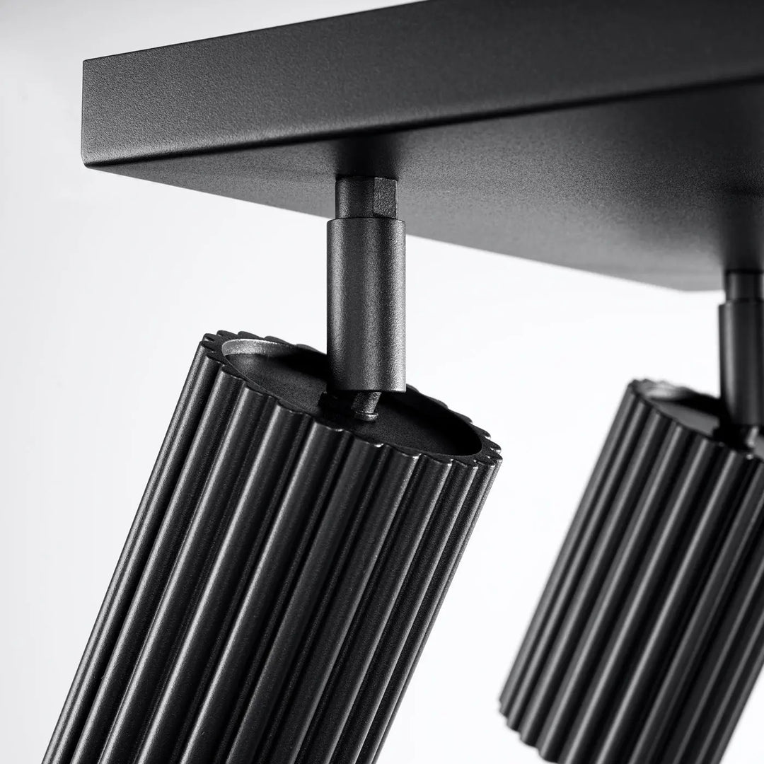 Luminaire plafonnier karbon 4 noir en aluminium nervuré avec finition mate et ampoules gu10 interchangeables design minimaliste