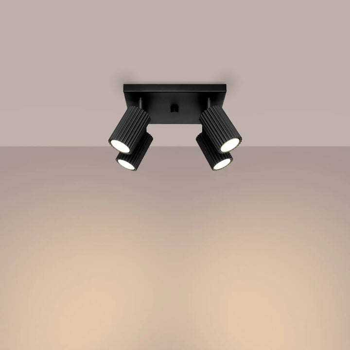 Plafonnier karbon 4 noir avec trois têtes cylindriques ajustables finition mate design minimaliste ampoules gu10 interchangeables