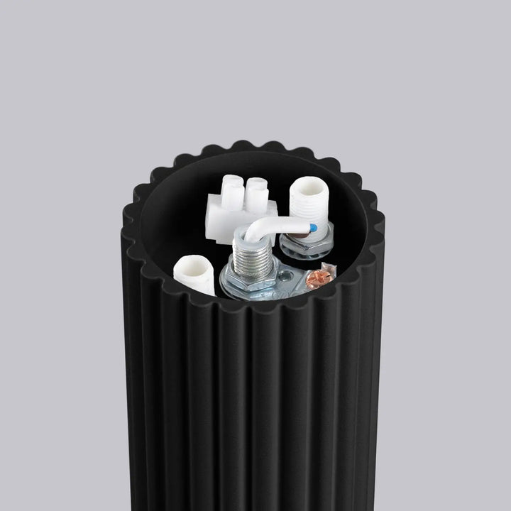 Radiateur cylindrique noir à nervures avec composants internes visibles pour bureau décorative lampe halo sphère laiteuse