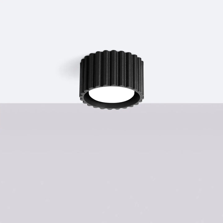 Luminaire plafonnier aura 1 noir avec forme unique inspirée, design moderne et surface nervurée en led noir