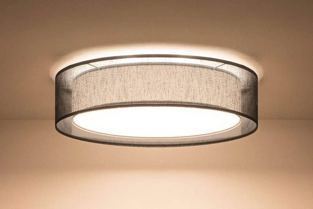 Luminaire plafonnier noir circulaire avec abat-jour en tissu gris foncé texturé et cadre métallique élégant puRO