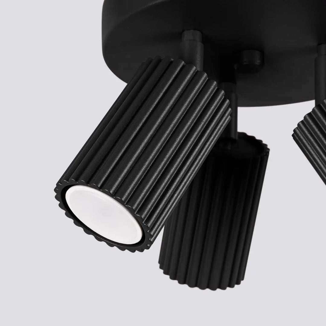 Luminaire plafonnier karbon 3p noir avec spots led noires rainurées minimalistes et ampoules gu10 interchangeables
