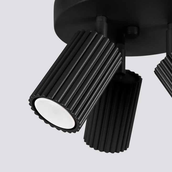 Luminaire plafonnier karbon 3p noir avec spots led noires rainurées minimalistes et ampoules gu10 interchangeables