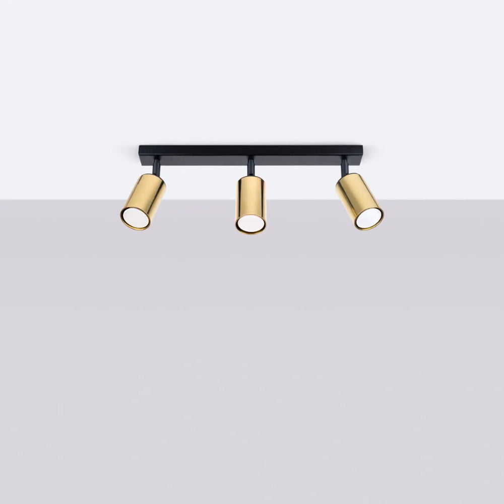 Plafonnier winx noir cooper avec trois spots cylindriques ajustables en finition or moderne pour éclairage intérieur