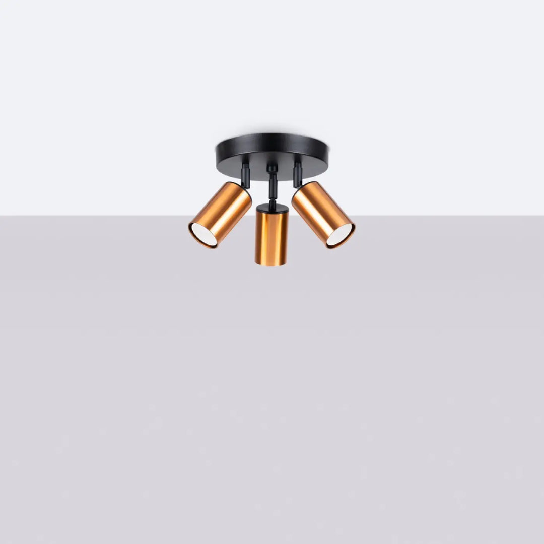 Luminaire plafonnier winx 3p avec trois têtes cylindriques réglables en cuivre sur base noire design winx allie