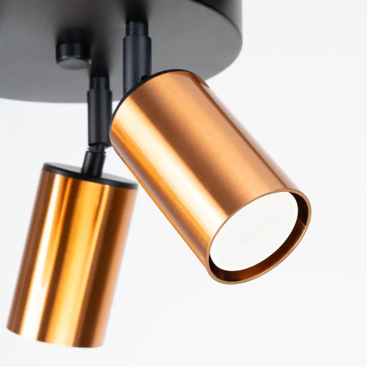 Luminaire plafonnier winx 3p avec spots cylindriques finition cuivre et support noir de lampe winx allie design