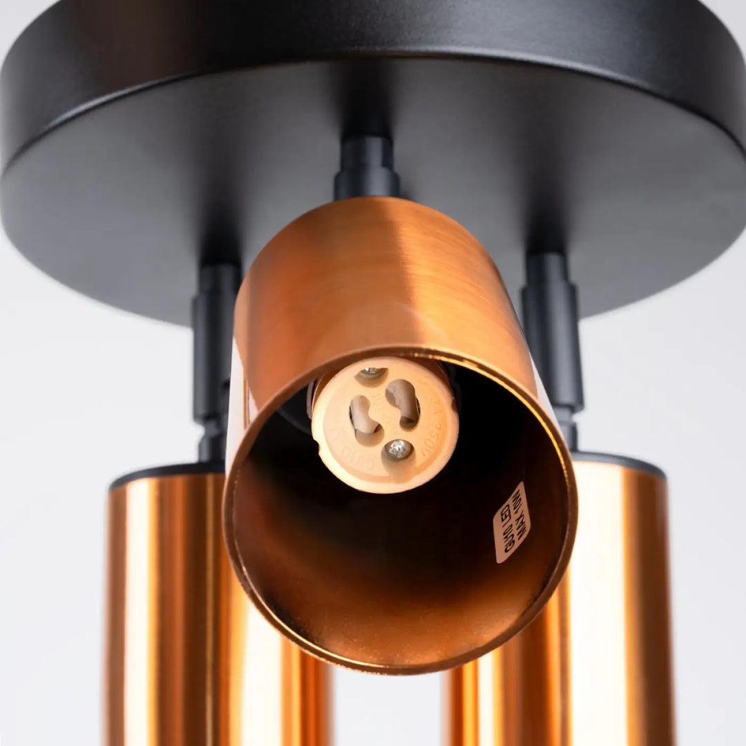 Plafonnier winx en cuivre avec fixation noire mate, lampe winx allie design moderne et élégance cylindrique