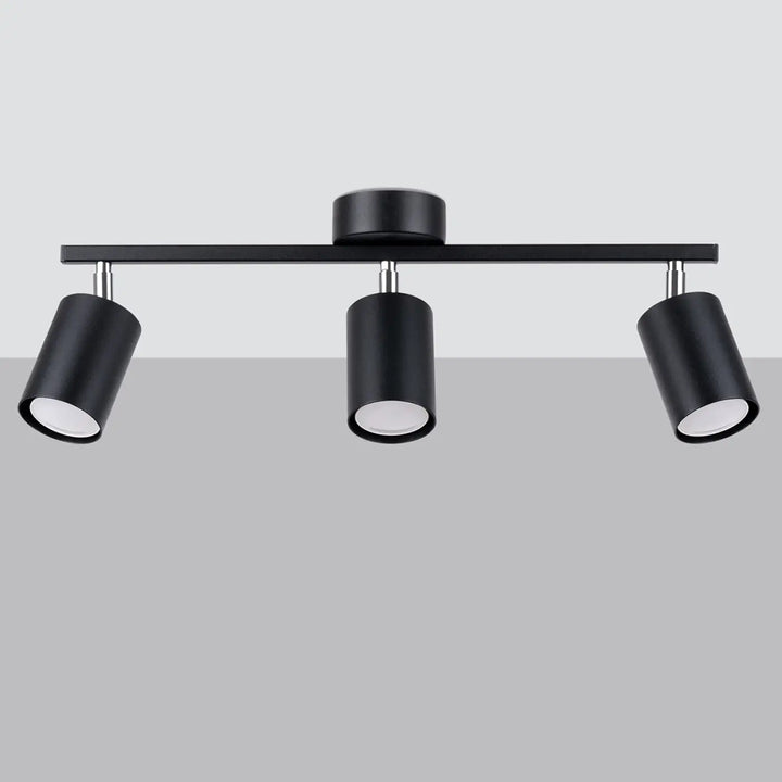 Luminaire plafonnier lemmi 3 noir avec trois spots cylindriques en module led pour une lumière conviviale