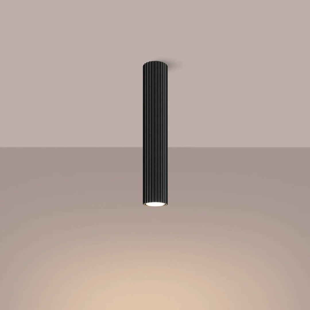 Plafonnier karbon noir cylindrique avec rainures verticales et base illuminée blanc chaud design minimaliste ampoules gu10 interchangeables