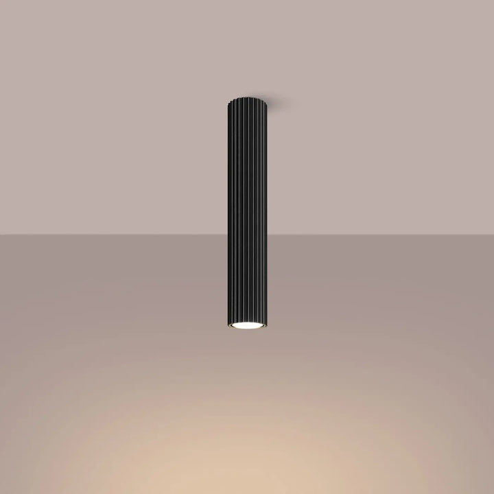 Plafonnier karbon noir cylindrique avec rainures verticales et base illuminée blanc chaud design minimaliste ampoules gu10 interchangeables