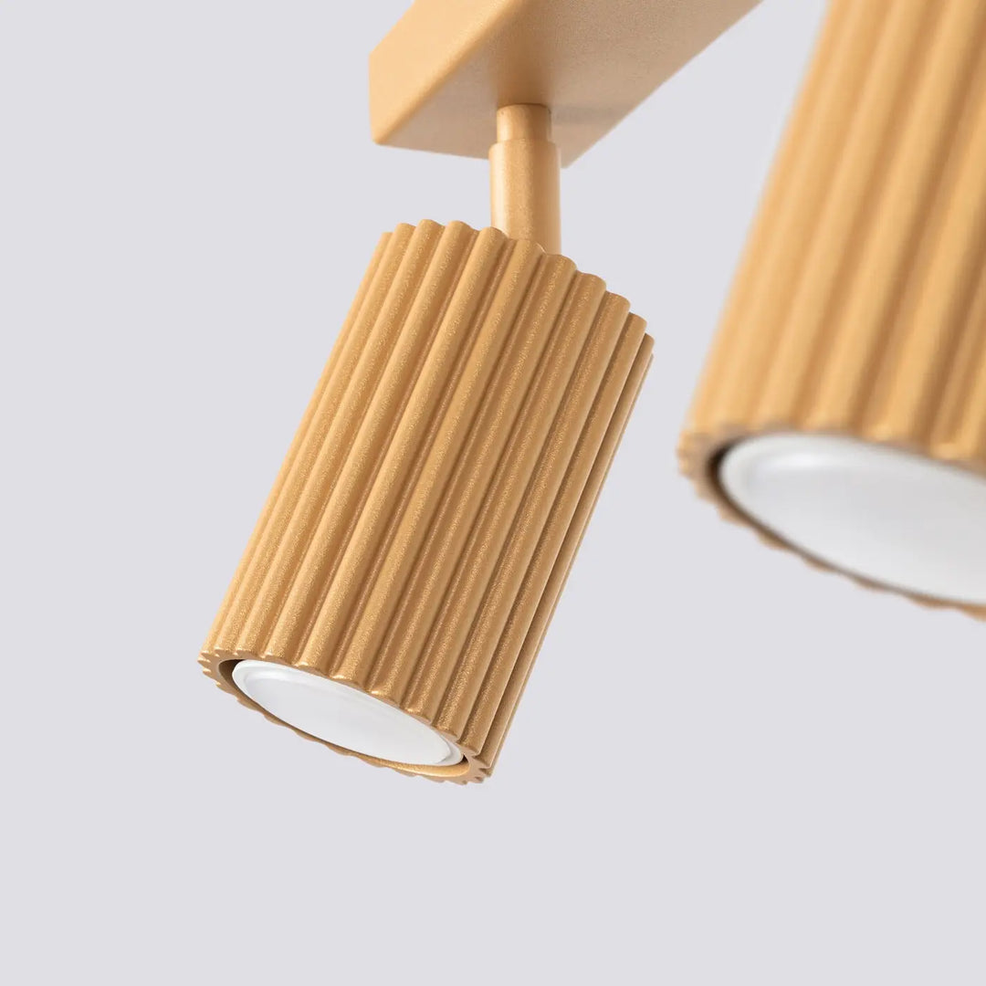 Plafonnier karbon allie design minimaliste with warm-toned ribbed cylindrical spotlight and matte wood-finish housing