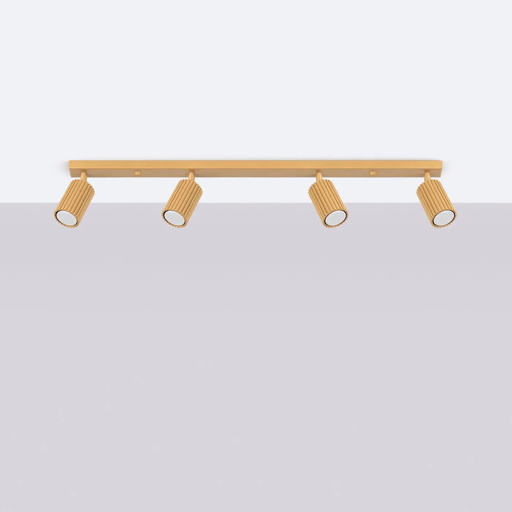 Plafonnier karbon allie design minimaliste avec quatre spots réglables en or et ampoules gu10 interchangeables