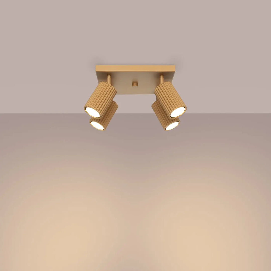 Plafonnier karbon allie à trois têtes cylindriques réglables or avec ampoules gu10 interchangeables design minimaliste