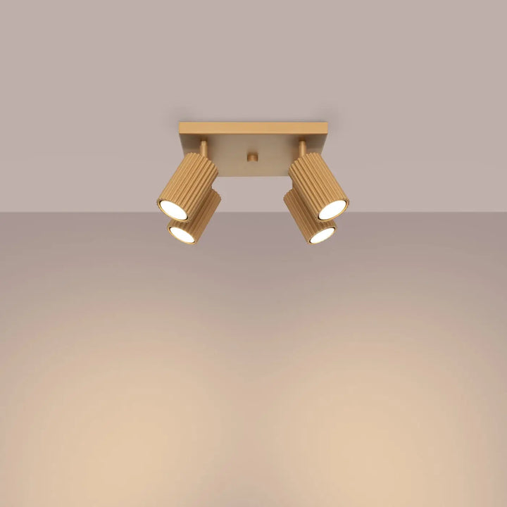 Plafonnier karbon allie à trois têtes cylindriques réglables or avec ampoules gu10 interchangeables design minimaliste