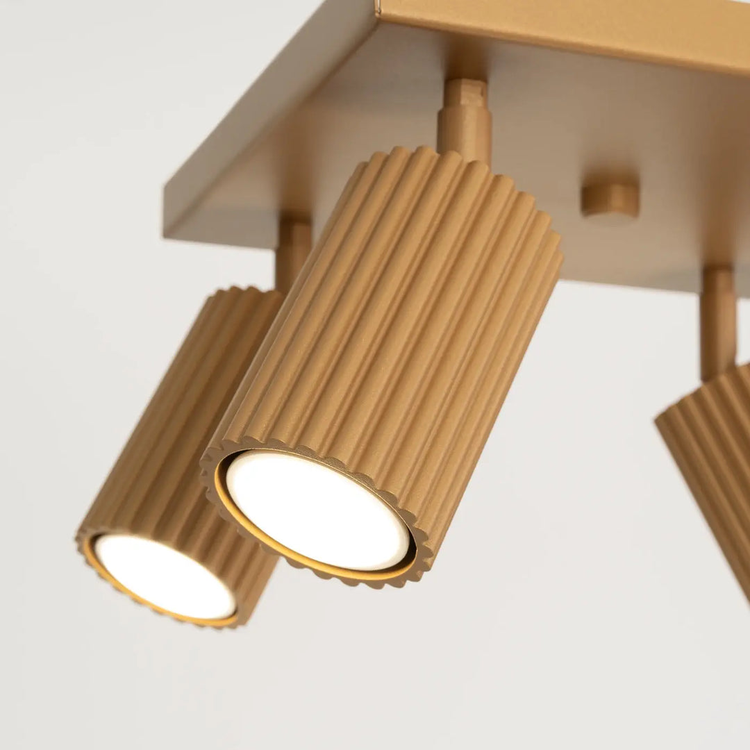 Luminaire plafonnier karbon 4 or en métal doré avec design minimaliste et ampoules gu10 interchangeables