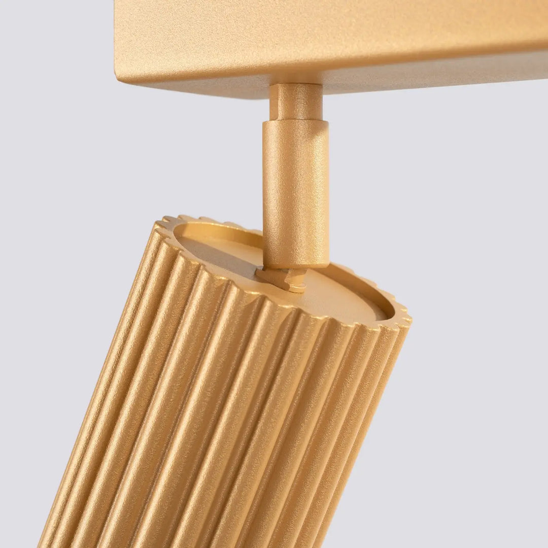 Luminaire plafonnier karbon 2 or avec abat-jour cylindrique cannelé finition métallique dorée design minimaliste et ampoules gu10 interchangeables