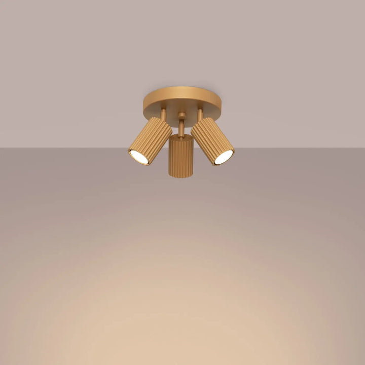 Plafonnier karbon allie or avec trois têtes cylindriques réglables et ampoules gu10 interchangeables design minimaliste