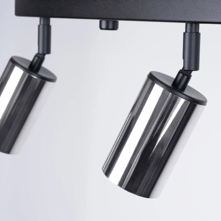 Luminaire plafonnier winx 4l noir avec têtes cylindriques chromées modernes pour un éclairage design