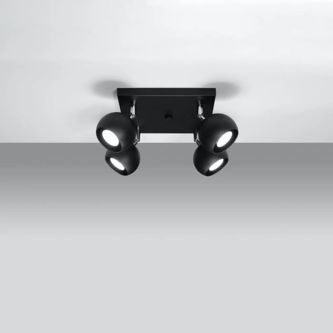 Plafonnier oculare noir mat avec quatre têtes sphériques réglables pour éclairez précisément avec un design original