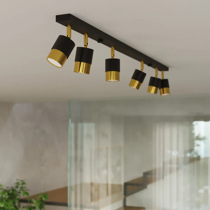Plafonnier applique moderne nero 6 noir doré avec cinq spots ajustables de la collection nero pour totale liberté d’éclairage
