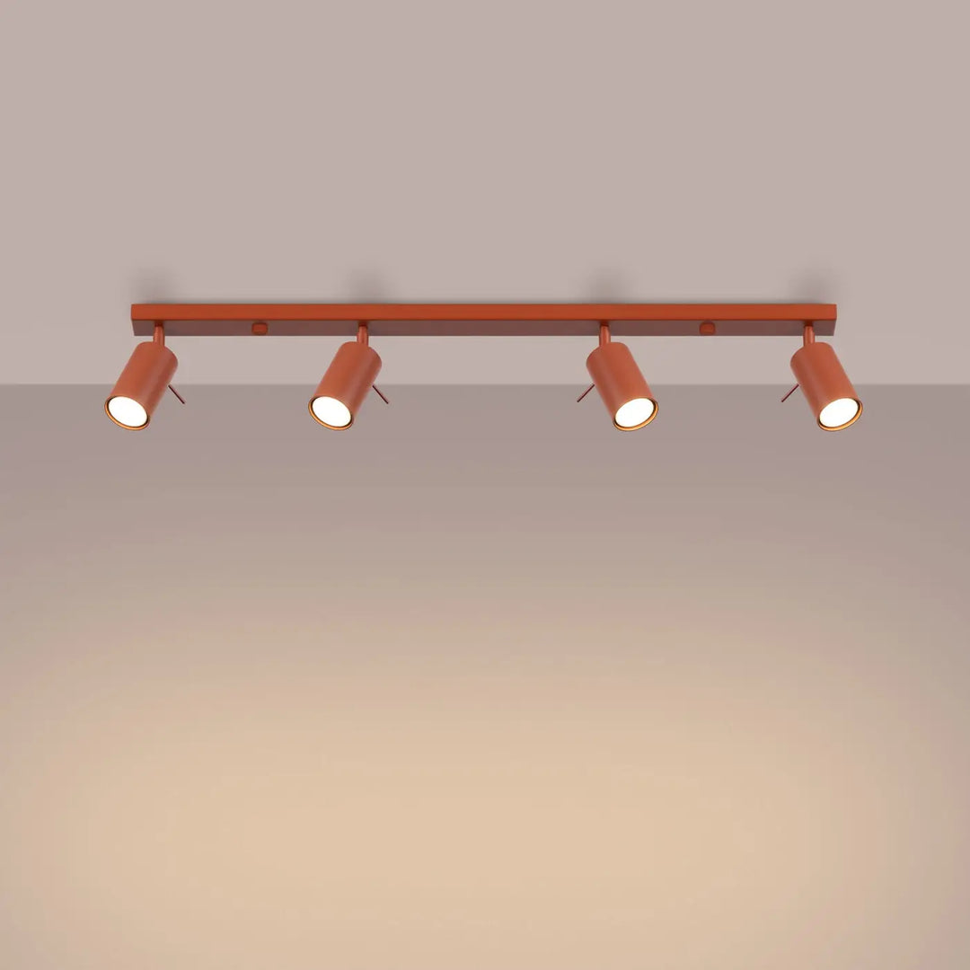 Luminaire plafonnier ring 4l rouge ochra en métal avec quatre spots cylindriques offrant un éclairage flexible minimalisme moderne
