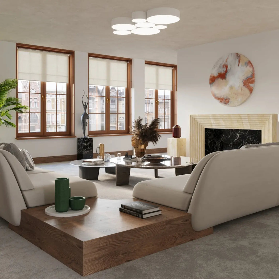 Plafonnier rond arena 45 blanc avec éclairage polyvalent et forme riche associé à un canapé sectionnel beige en tissu