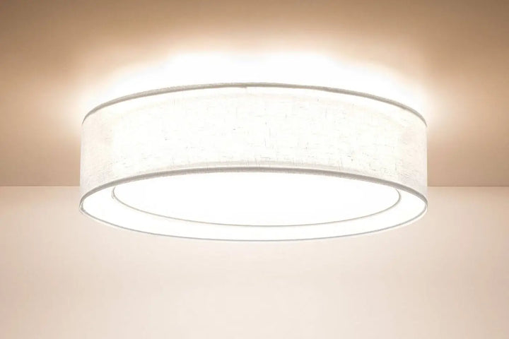 Luminaire plafonnier puro blanc avec abat-jour en tissu blanc et bord métallique pour un plafonnier rond blanc moderne