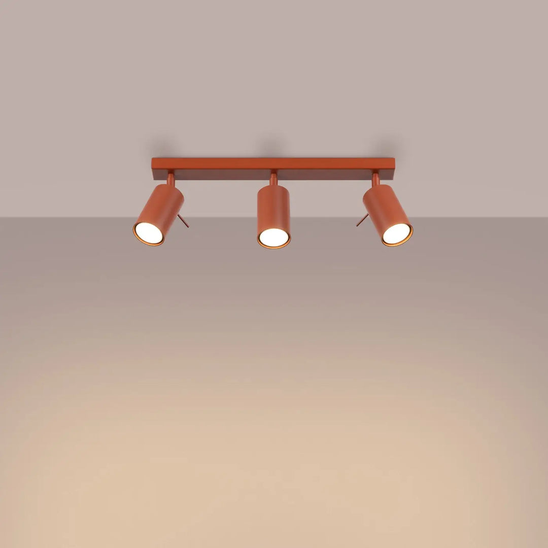 Luminaire plafonnier cuivre lampe ring trois spots cylindriques éclairage flexible minimalisme moderne rouge ochra