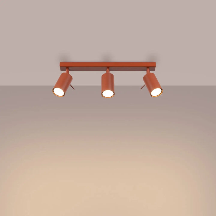 Luminaire plafonnier cuivre lampe ring trois spots cylindriques éclairage flexible minimalisme moderne rouge ochra