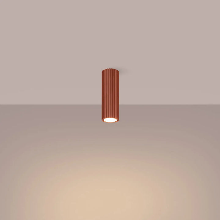 Plafonnier karbon allie design minimaliste en cuivre rouge ocre avec ampoules gu10 interchangeables et base éclairée