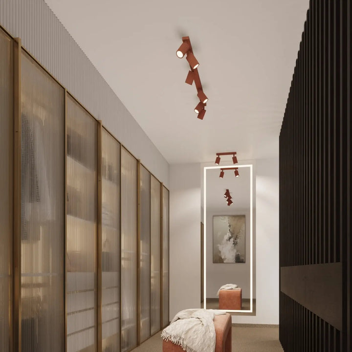 Luminaire plafonnier karbon 2 en cuivre réglable avec design minimaliste et ampoules gu10 interchangeables rouge ocre
