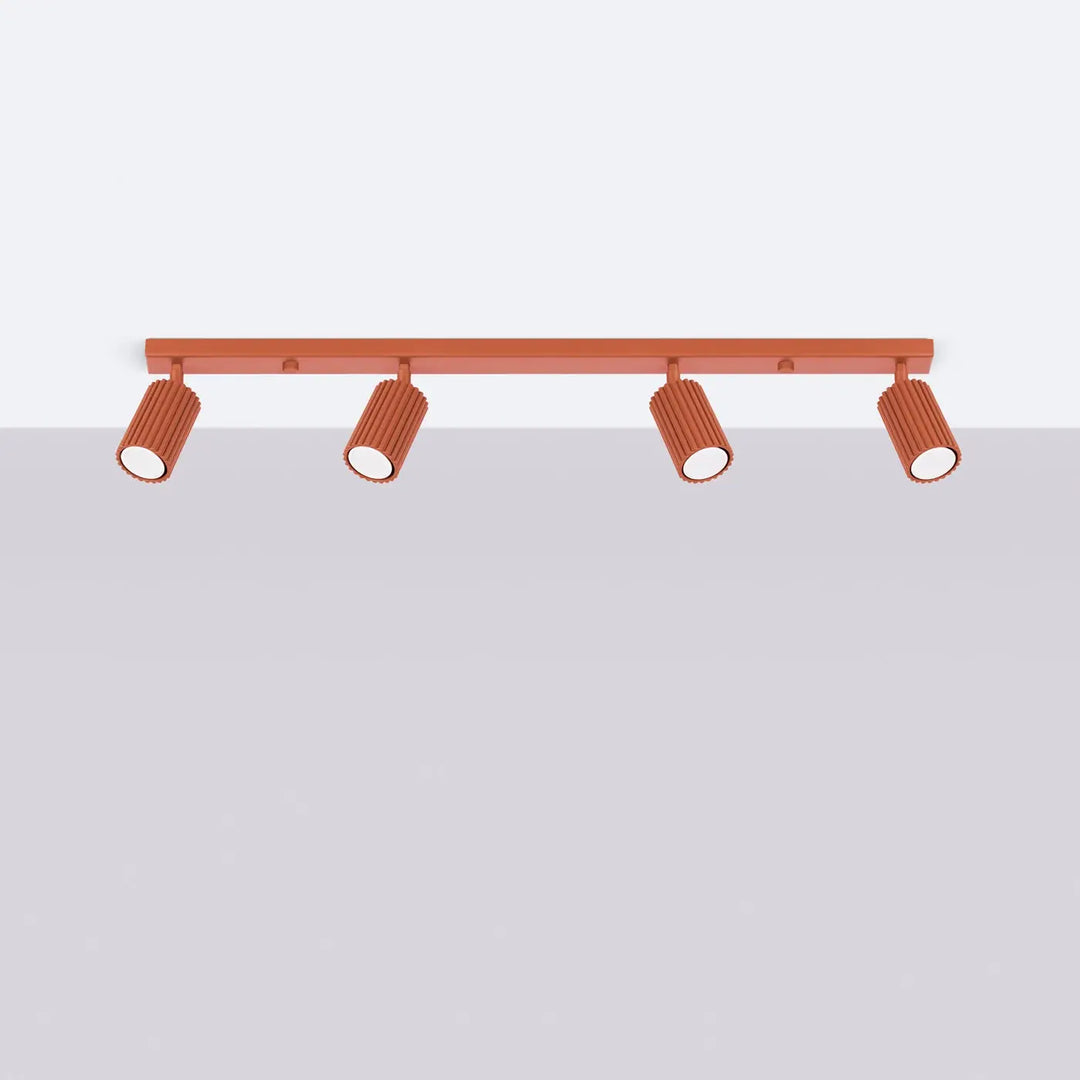 Plafonnier karbon allie en cuivre avec quatre spots cylindriques rainurés et ampoules gu10 interchangeables style minimalisme