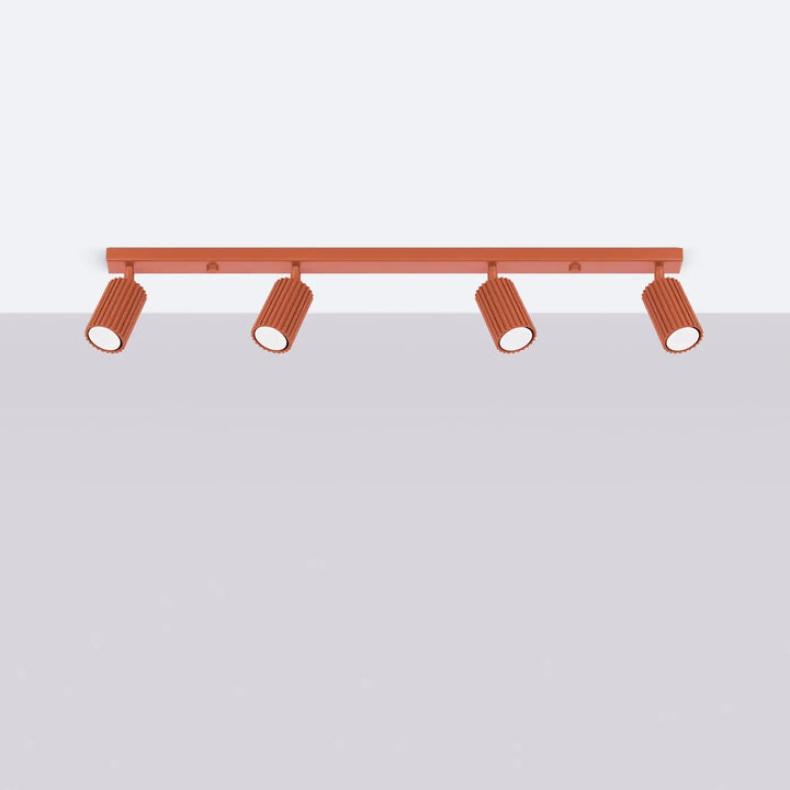Plafonnier karbon allie en cuivre avec quatre spots cylindriques rainurés et ampoules gu10 interchangeables style minimalisme