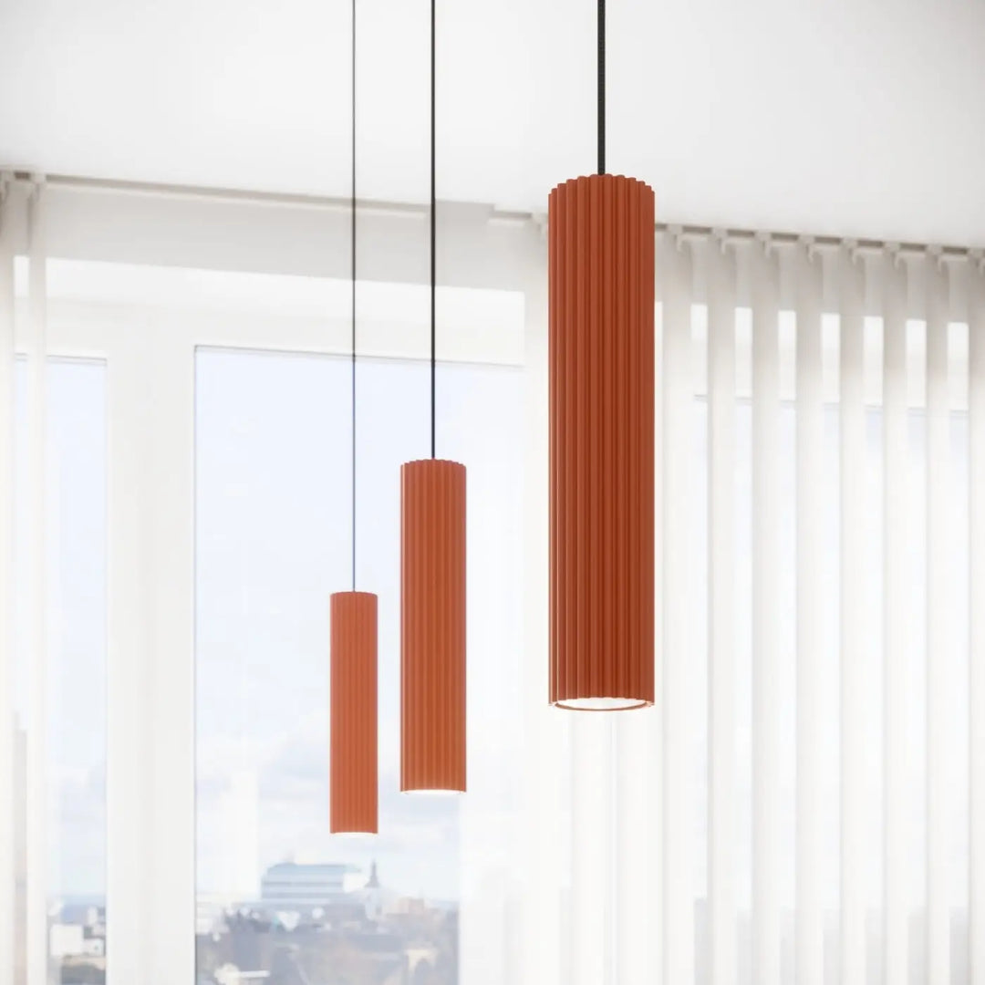 Trois plafonniers Karbon allie cylindriques orange ocre avec ampoules gu10 interchangeables en style minimalisme