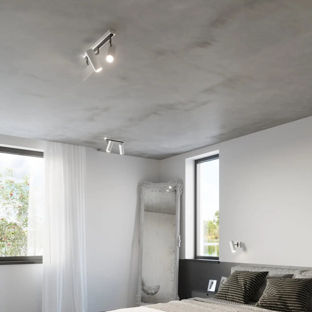 Luminaire plafonnier série direzione blanc avec éclairage élégant et spots ajustables pour plafond minimaliste