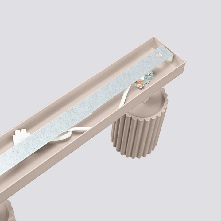 Plafonnier karbon taupe avec tête cylindrique côtelée et support métallique pour ampoules gu10 interchangeables design minimaliste