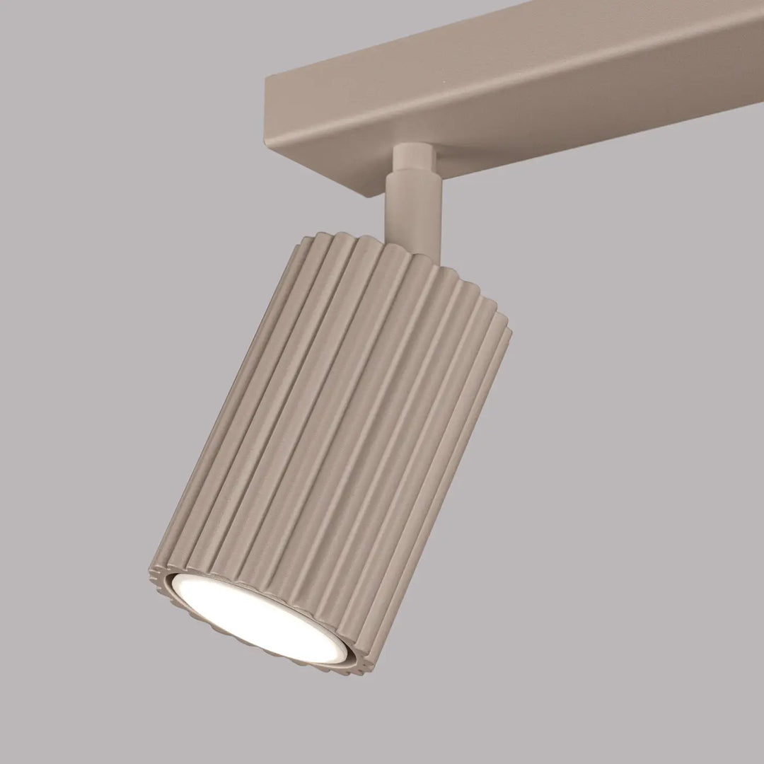 Plafonnier karbon allie beige taupe design minimaliste avec ampoules gu10 interchangeables et rail cylindrique ribbé