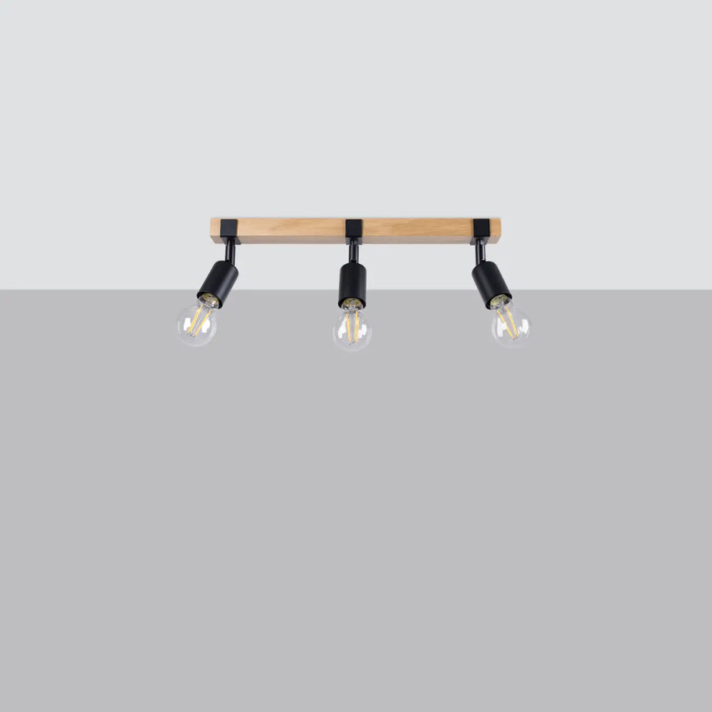 Luminaire plafonnier série zuca 3 noir avec barre en bois clair et ampoules décoratives visibles petites œuvres d’art