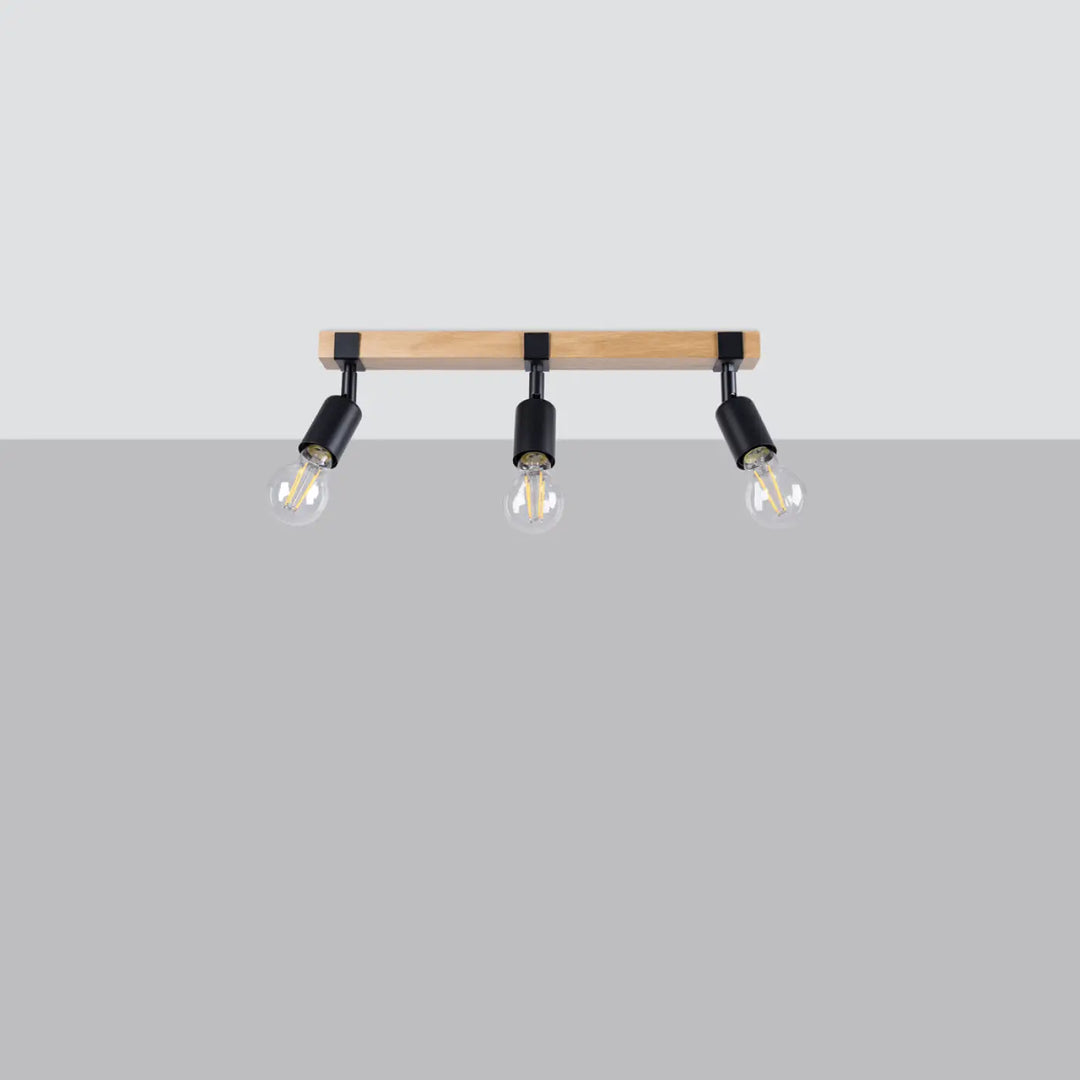Luminaire plafonnier série zuca 3 noir avec barre en bois clair et ampoules décoratives visibles petites œuvres d’art