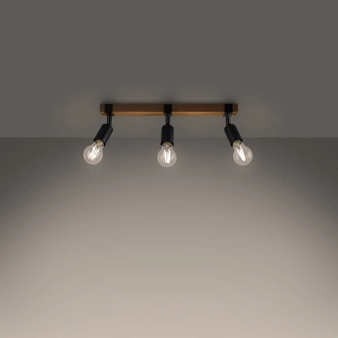 Luminaire plafonnier série zuca 3 noir avec ampoules décoratives visibles et petites œuvres dart sur barre en bois élégant